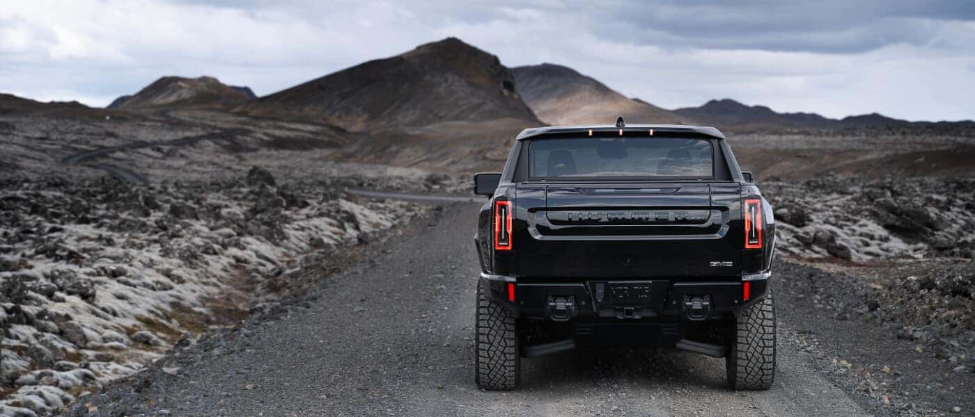 2025 GMC Hummer EV Pickup Exterior Driving On Rocky Road