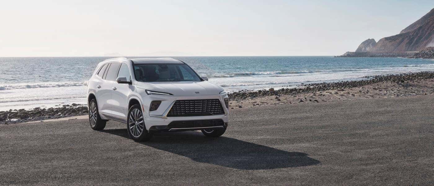 2027 Buick Enclave parked on a beach