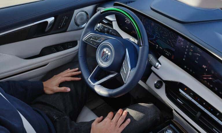 2027 Buick Enclave steering wheel with driver