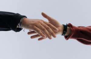 Hands reaching out for eachother