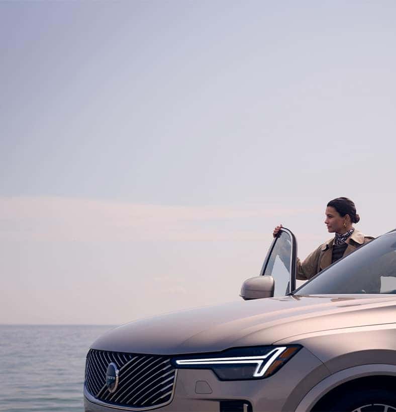 2025 Volvo XC90 | Woman stepping out of her parked 2025 Volvo XC90