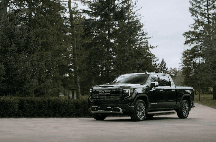 Sierra truck driving down road