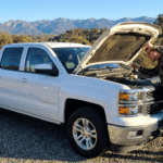 Chevrolet Silverado oil level check in Auburn CA driveway.