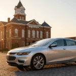 Used Chevrolet Malibu parked in downtown Auburn CA showing sleek exterior design