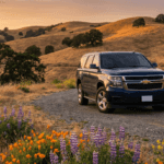 Chevrolet SUV on wildflower-lined foothill road near Auburn CA