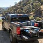 Chevrolet Colorado packed for Confluence Trail day trip in Auburn, CA with hydration and safety gear