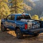 2026 Chevrolet Colorado with camping gear set up in the truck bed at an Auburn, CA Sierra Nevada foothills campsite