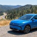 2026 Chevrolet Equinox EV parked at an I-80 overlook in the Sierra Nevada foothills east of Auburn, CA, summer