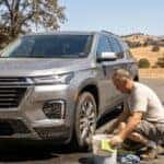 2026 Chevy Traverse with bug splatter on front bumper and hood after a highway road trip near Auburn, CA