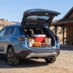 2027 Chevrolet Equinox rear liftgate open with cooler and picnic supplies at an Auburn California country market