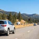 2025 Chevrolet Traverse on I-80 through the Sierra Nevada foothills near Auburn, CA on a sunny summer day