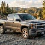 Pre-owned Chevrolet Silverado 1500 crew cab at a Placer County, CA work site in the Sierra Nevada foothills