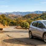 Used Chevrolet Bolt EV parked on a Sierra Nevada foothills road near Auburn, CA
