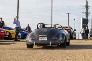 Black Classic Car Exiting Car Show