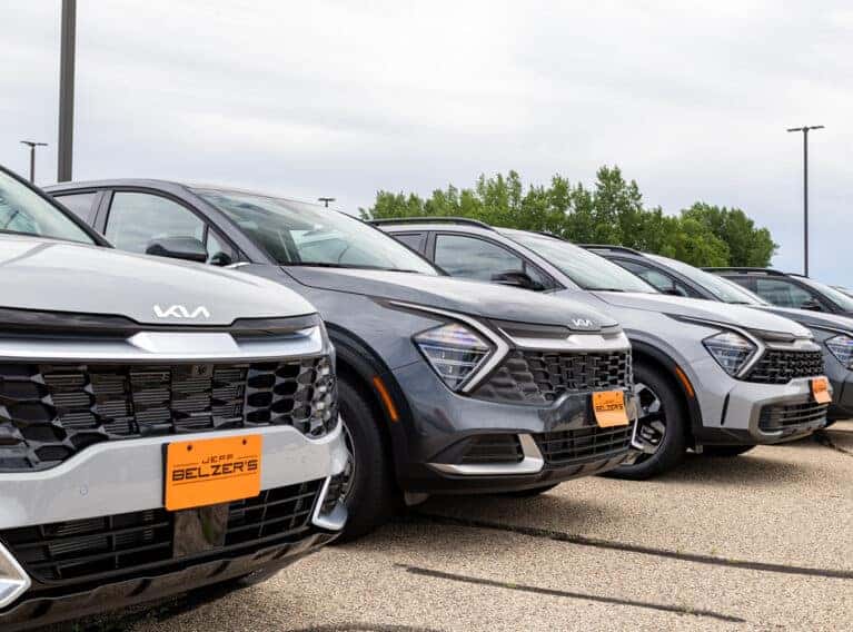 Lineup of Kia Sportages on Lot