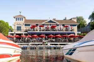 Charlie's on Prior outdoor seating with tables, umbrellas, and people 