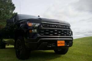 Black Chevrolet Truck on Golf Green 