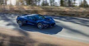 blue Chevrolet Corvette ZR1 driving on road