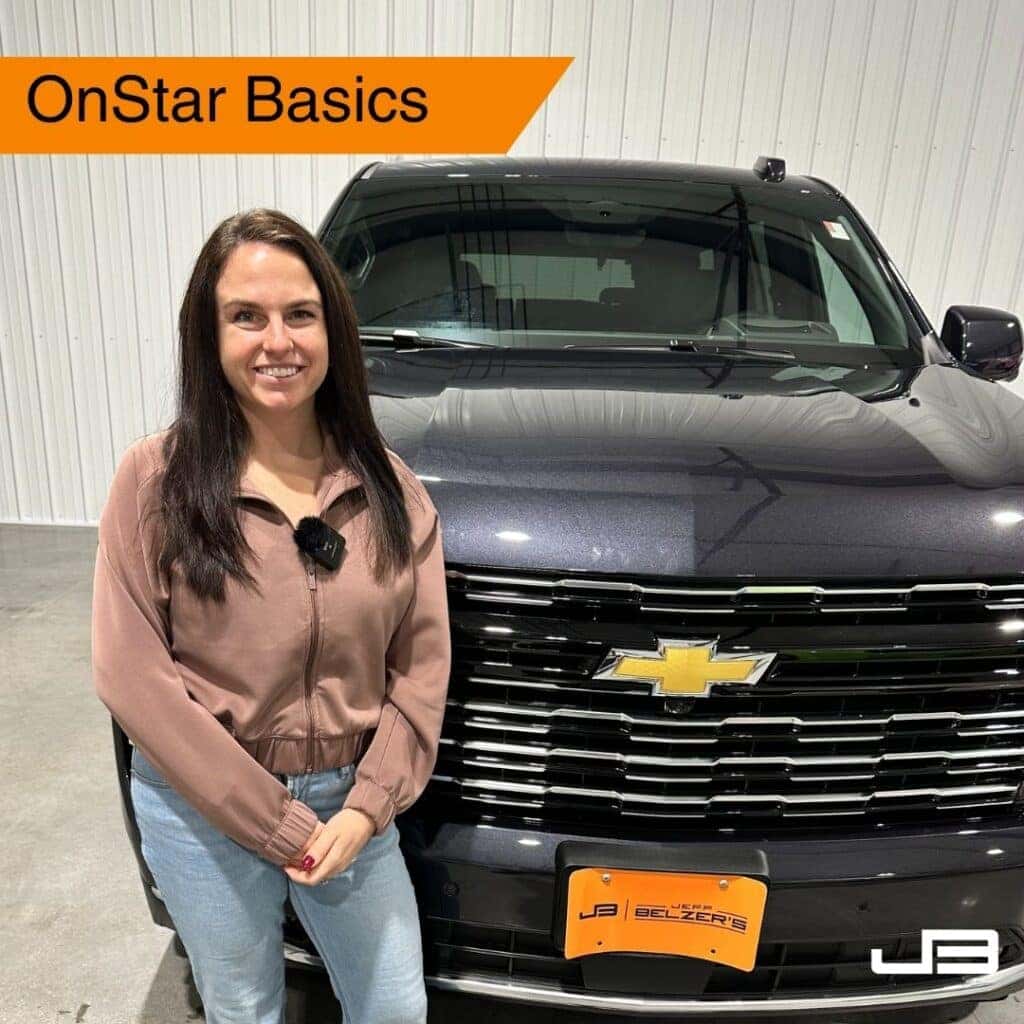 product expert Allye standing in front of a 2025 Chevy Tahoe