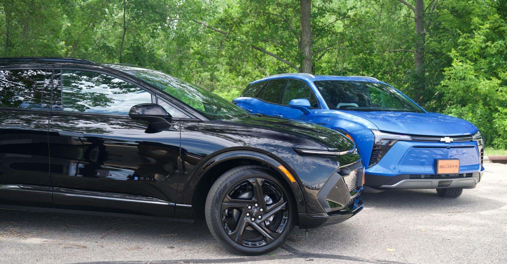 black equinox ev and blue blazer ev