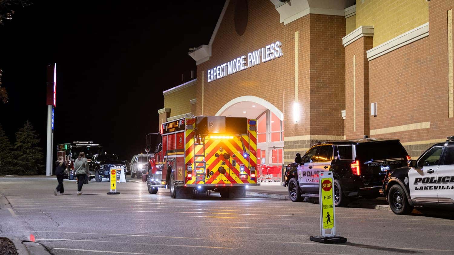 fire trucks and police cars in front of Lakeville Target at Shop with a Hero event