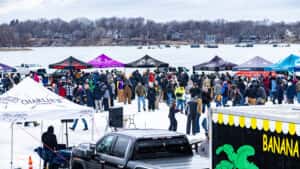 aerial shot of tents and attendees at Charlie's on Prior Beer & BBQ Fest