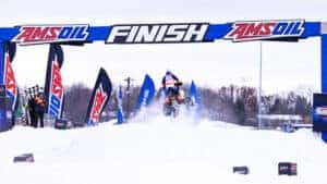 Moras Racing crossing the finish line at Snocross event