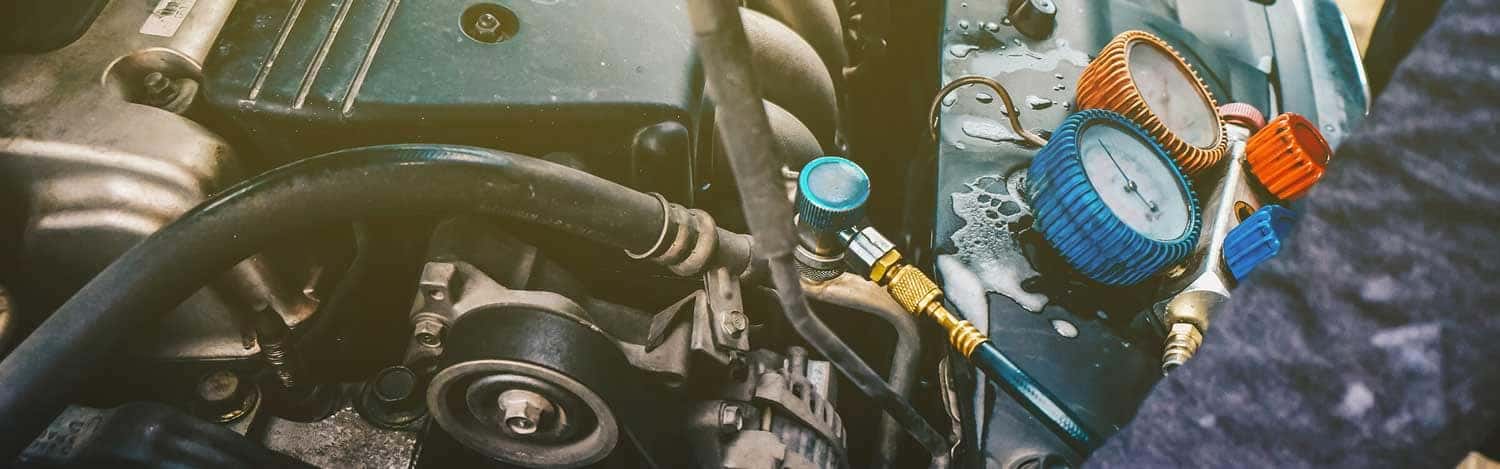Close up view of a/c getting repaired 