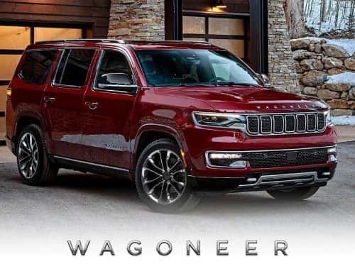 2024 Wagoneer parked outside a modern home