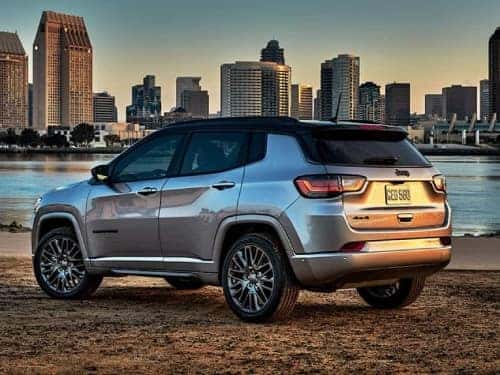 2024 Jeep Compass exterior view of car parked outside a city near a lake