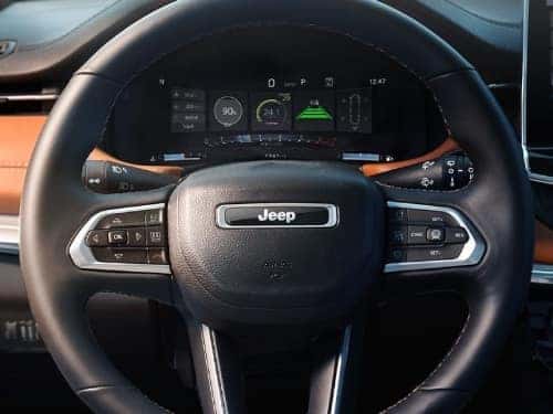 2025 Jeep Compass close up view of steering wheel