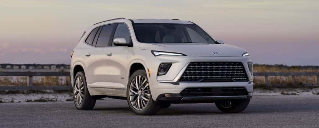 2025 Buick Enclave Preferred parked in front of a modern building