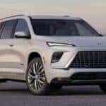 2025 Buick Enclave Preferred parked in front of a modern building