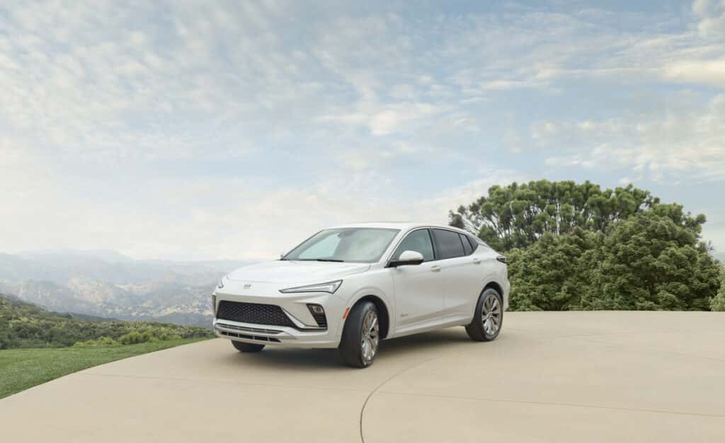 2025 Buick Envista Avenir parked in front of modern architecture