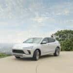 2025 Buick Envista Avenir parked in front of modern architecture