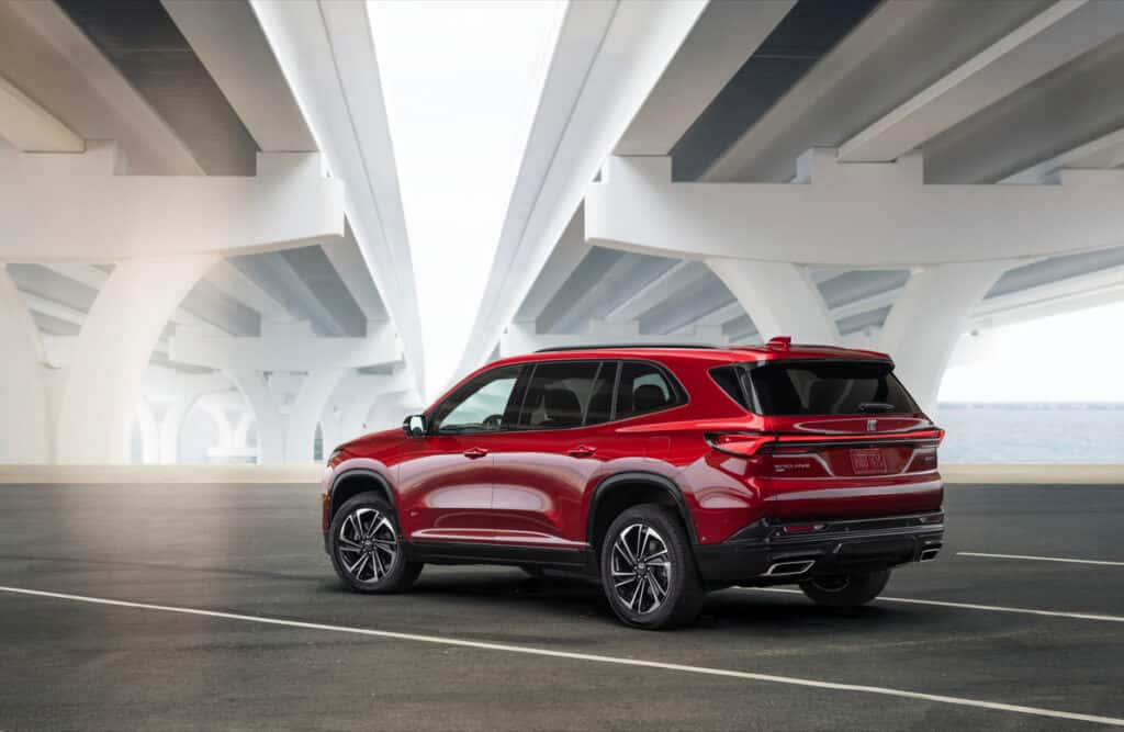 2025 Buick Enclave Avenir parked in front of modern home