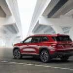 2025 Buick Enclave Avenir parked in front of modern home