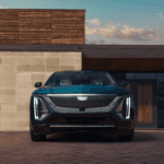2025 Cadillac emblem on illuminated grille at night