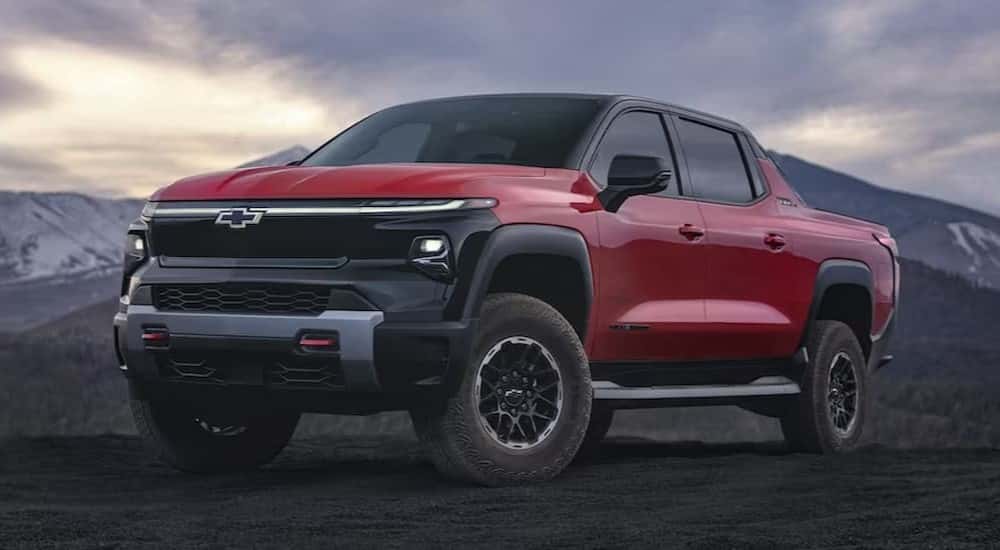 2025 Chevy Silverado EV Trail Boss is shown parked off-road.