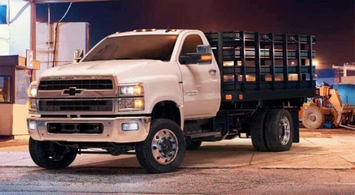 A whit e2025 Chevy Silverado 6500 for sale is shown from the front at an angle.