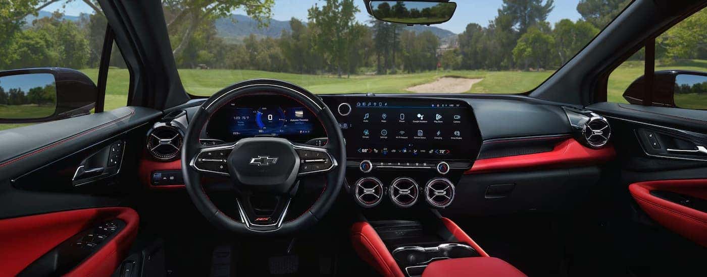 The black and red interior of a 2024 Chevy Blazer EV.