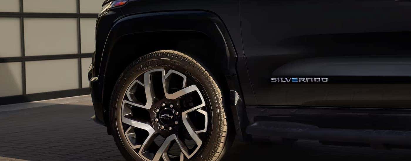 The side and tire on a 2025 Chevy Silverado EV for sale in Kernersville.
