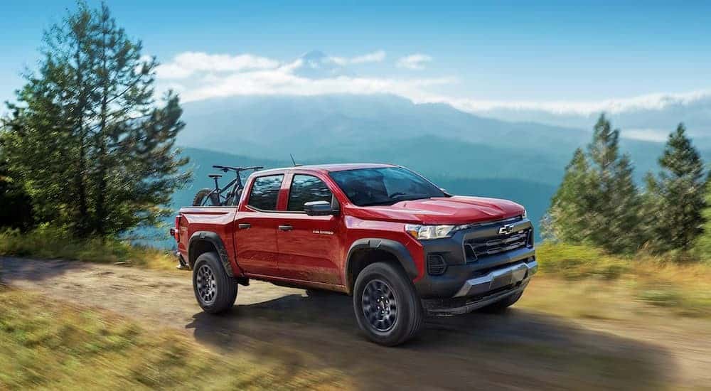 A red 2025 Chevy Colorado Trail Boss off-roading.