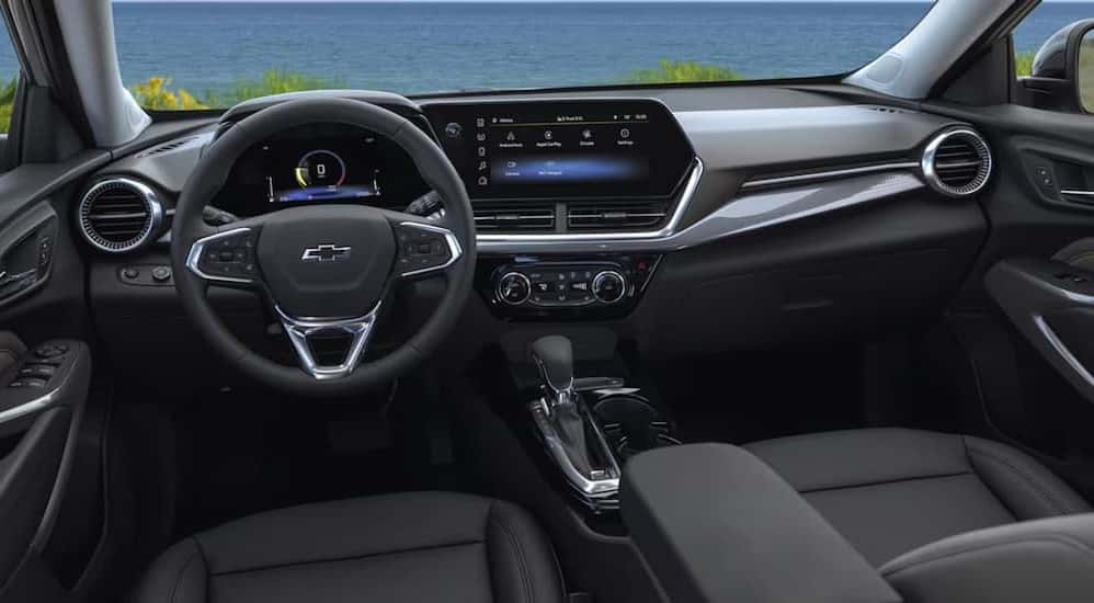 The black interior and dash in a 2025 Chevy Trax.