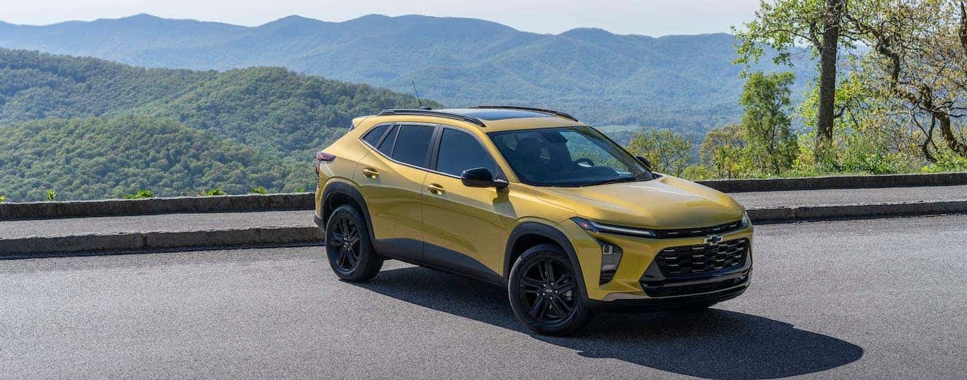 A yellow 2025 Chevy Trax for sale from the front.