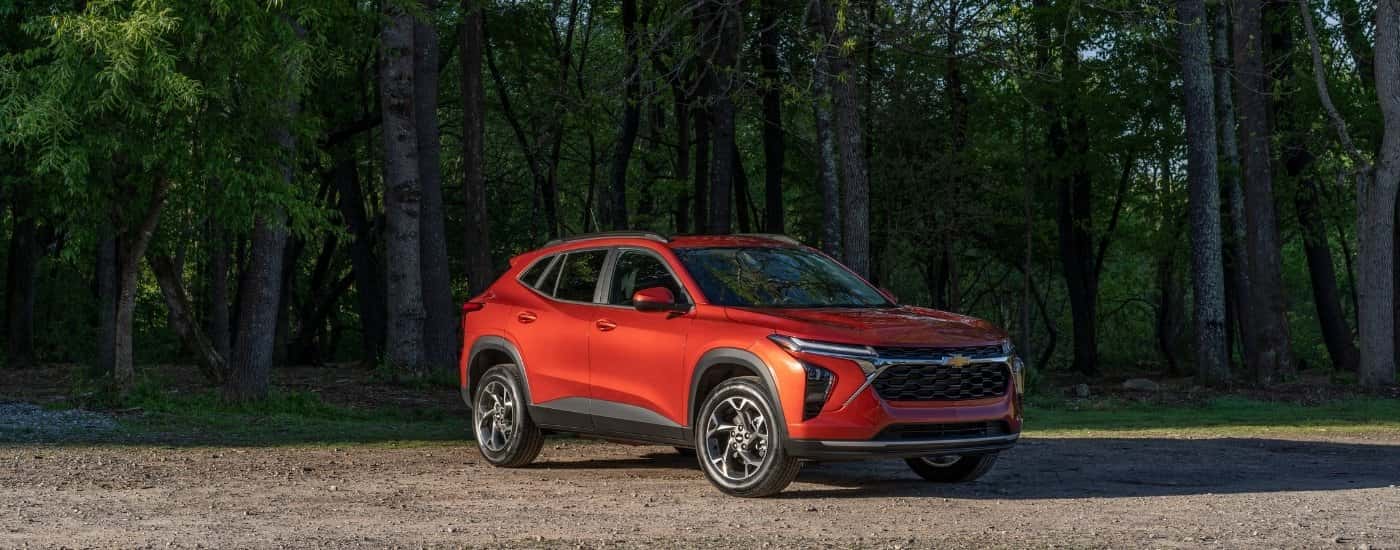 An orange 2025 Chevy Trax from the front at an angle.