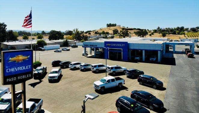 An exterior shot of a Chevrolet dealership during the day