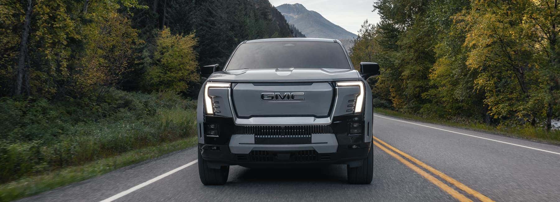 GMC driving down road