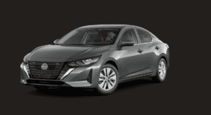 Grey Car with silver rims and black decails against a sleek black back drop