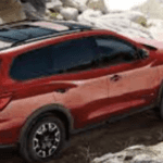 Nissan Pathfinder red against rocky backdrop